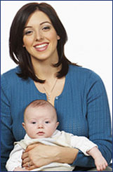smiling woman with baby